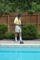 A pool professional finding a swim pool leak